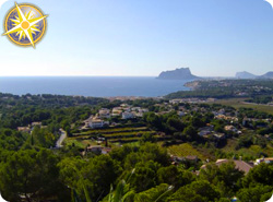 Moraira bay with the Rock of Calpe in the distance